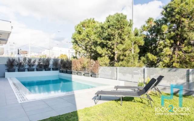 FULL FURNISHED MINIMAL APARTMEWNT WITH PRIVATE POOL AND GARDEN IN VERY GOOD CONDITION AT GLYFADA 